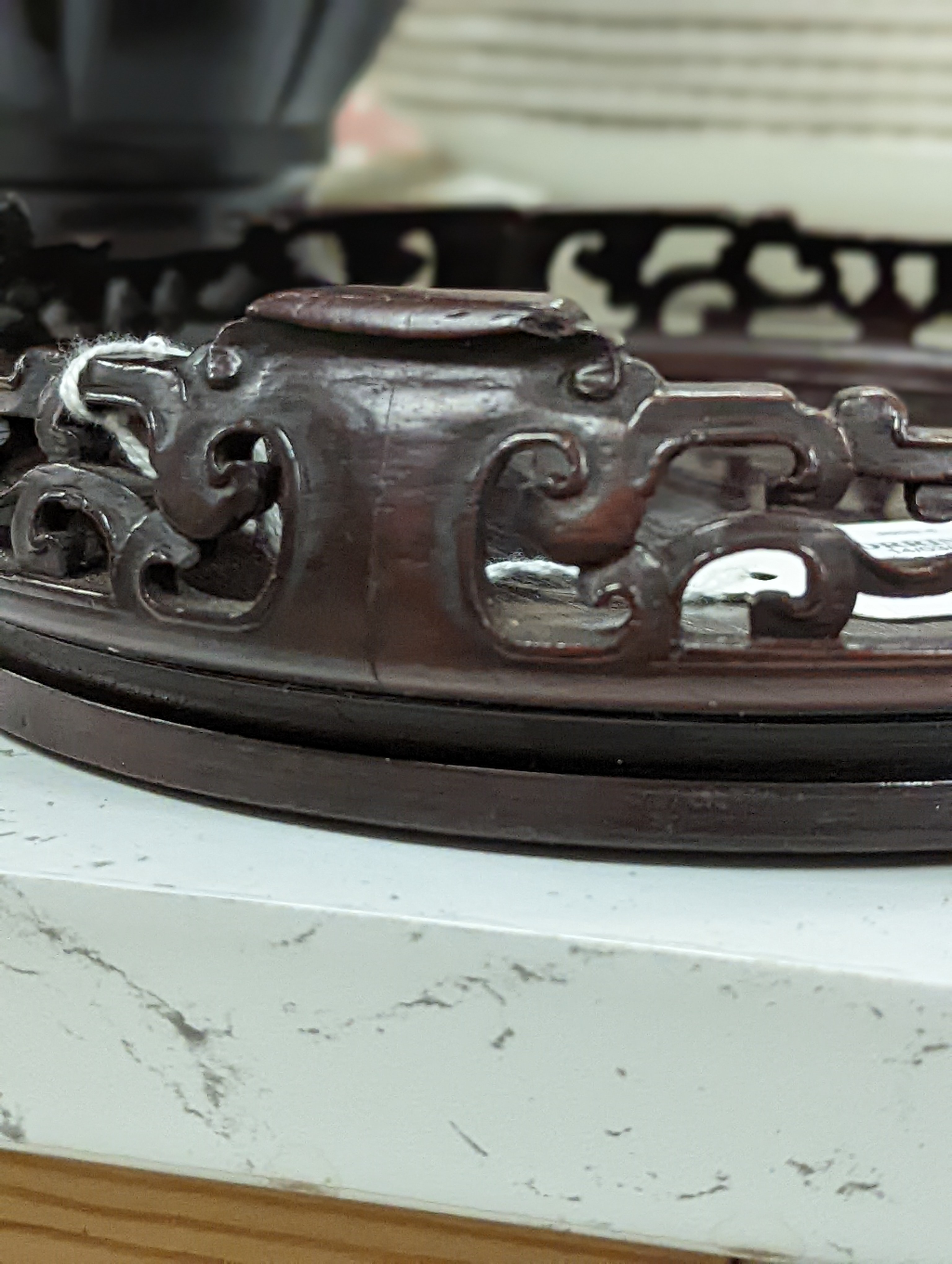 A Chinese carved hardwood stand 19cm